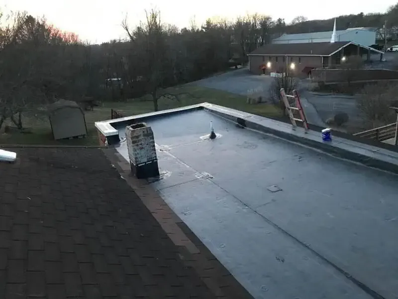 Combination shingle and flat roof system by Double R Roofing